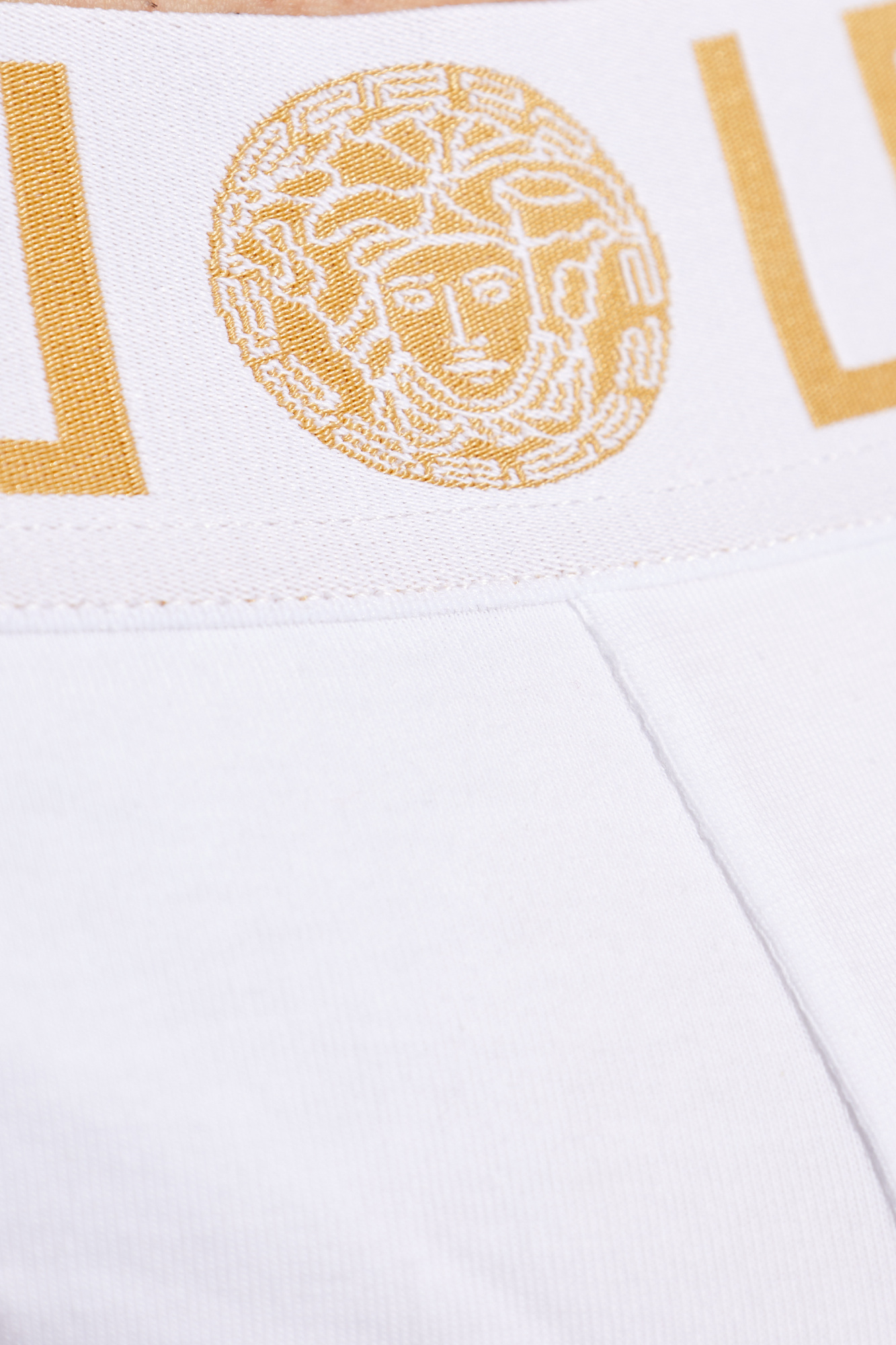 VERSACE ロコトライアンクルカッフタイファステントヒキニトッフ shirt with logo Versace - T - tulle logo-print T-shirt